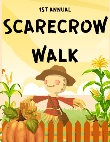 Image of happy scarecrow standing in field